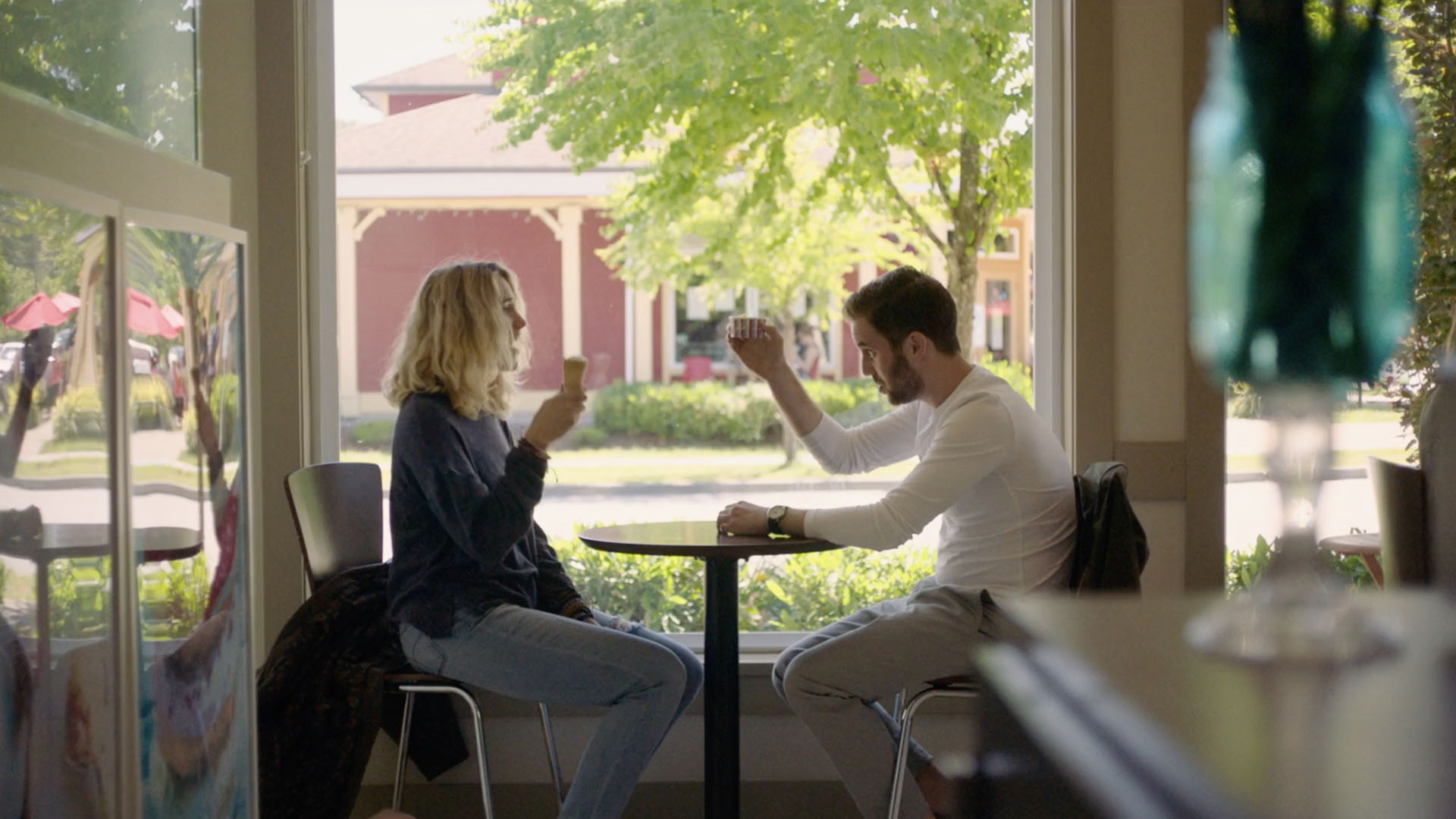 Trailer still frame from Broken Diamonds, man and woman eating ice cream