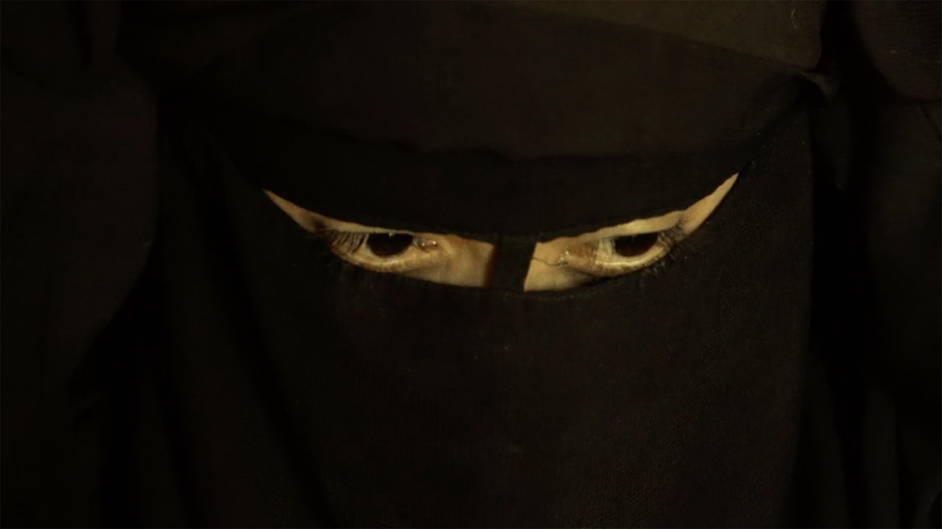 Trailer still frame from Sabaya, woman in burka